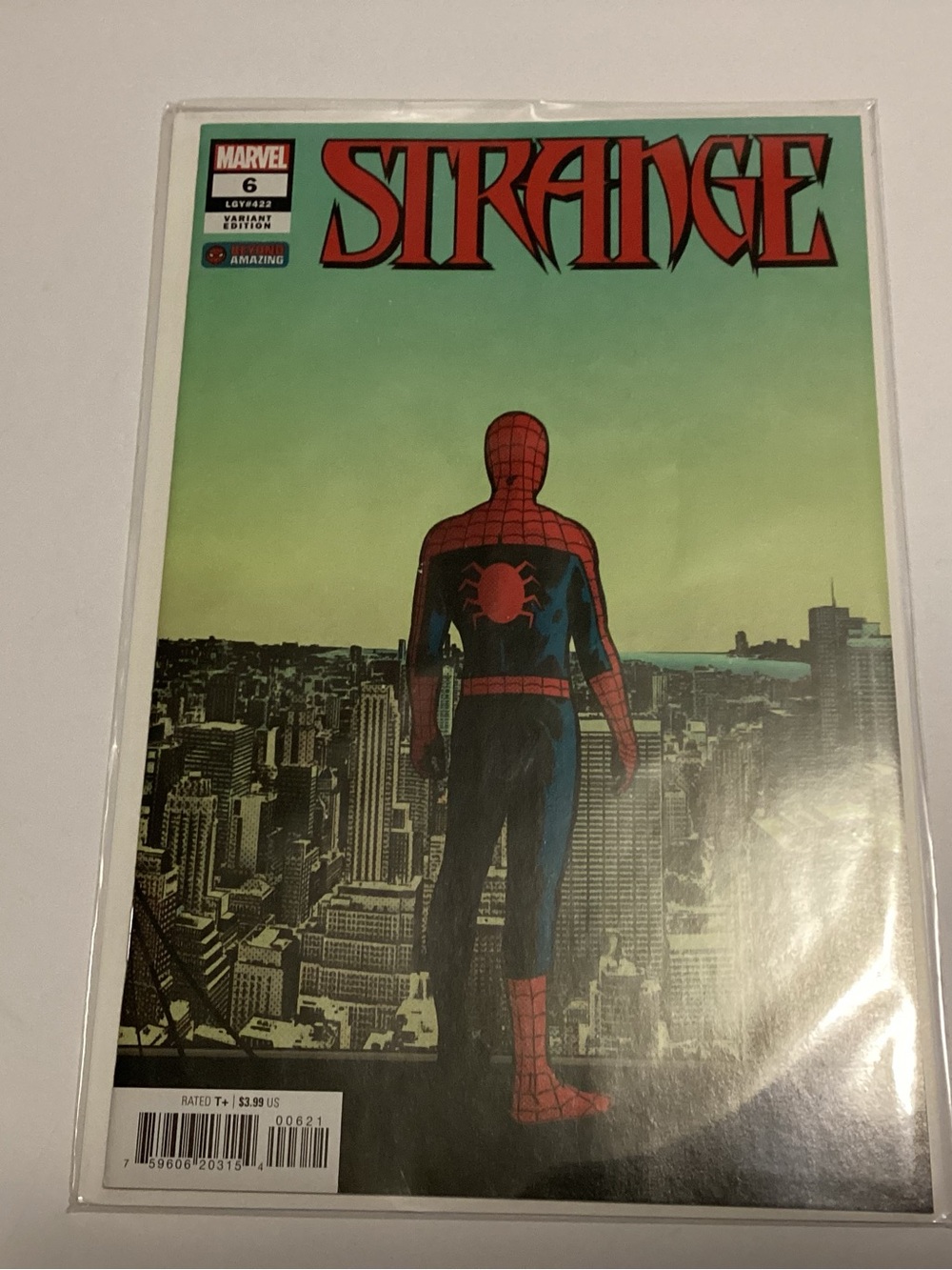 Marvel Spider-Man Comic with Green Gradient Cover